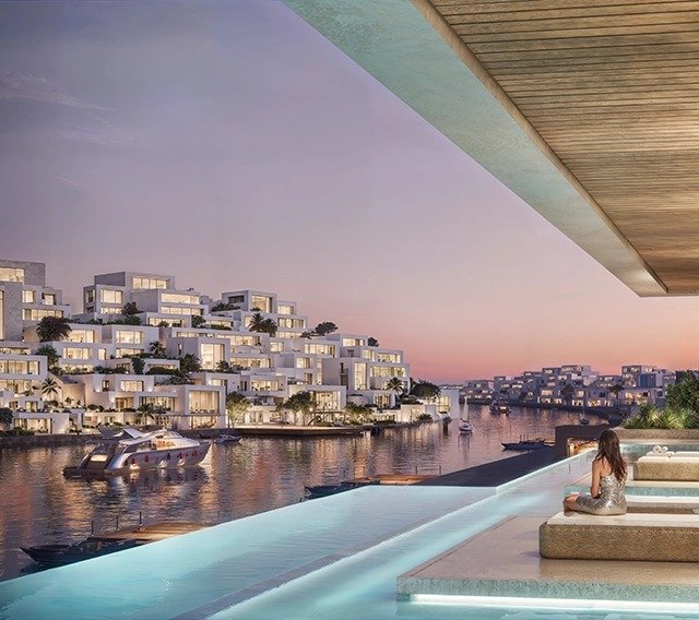 Infinity pool overlooking the sea at a branded Wadi Yemm resort residence